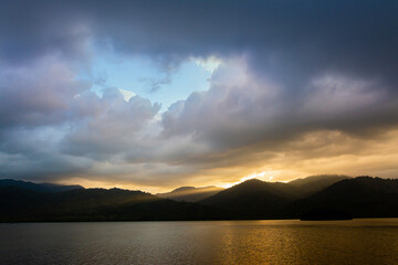 landscape Mountain with colorful vivid sunset on the cloudy sky