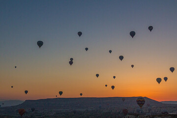 Aerial view of hot air balloons above Cappadocia, Turkey
