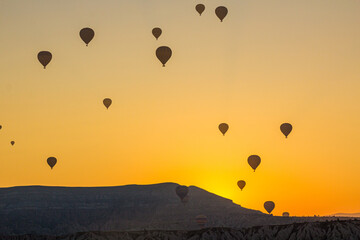 Hot air balloons above Cappadocia landscape, Turkey