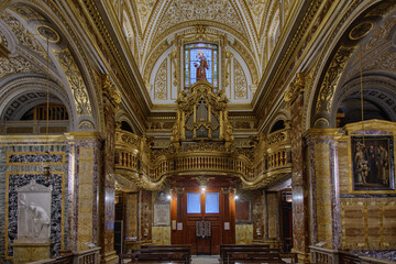 Fototapeta premium The organ of S. Antonio dei Portoghesi church in the Campo Marzio district of Rome 