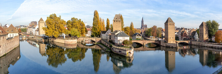 Fototapeta na wymiar La Petite France with bridge over river Ill water tower panorama Alsace in Strasbourg, France