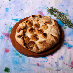 Homemade biscuit with figs and mascarpone on abstraction