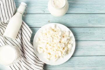 cottage cheese on a blue background. milk products