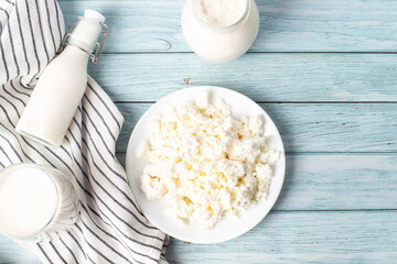cottage cheese on a blue background. milk products