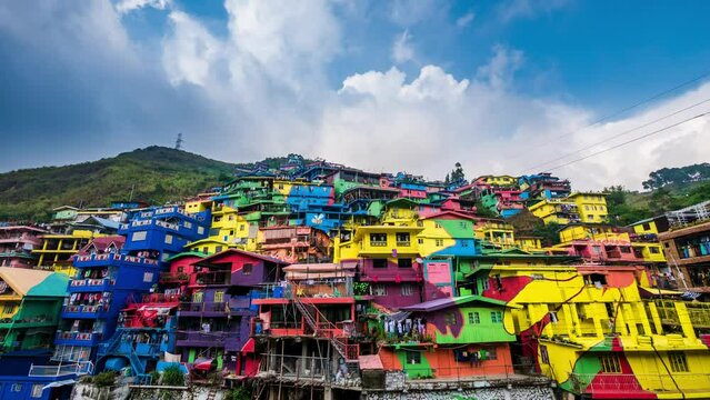 Time lapse view of the colourful Stobosa hillside homes  in La Trinidad, Benguet Province, Luzon Island, Philippines.