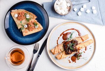 Ice cream pancakes and pancakes with red fish, Russian cuisine