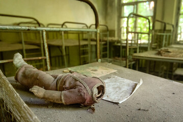 A doll in an abandoned nursery in abandoned Chernobyl region, site of the world's worst nuclear disaster