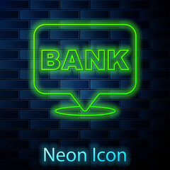 Glowing neon line Bank building icon isolated on brick wall background. Vector