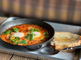 Shakshuka in a pan and toast