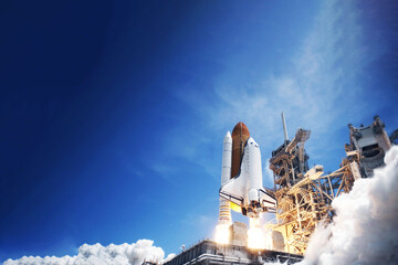 The launch of the space shuttle. With fire and smoke. Elements of this image were furnished by NASA