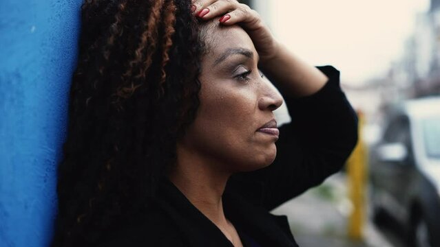 A Desperate African Woman Outside In Street Feeling Anxious