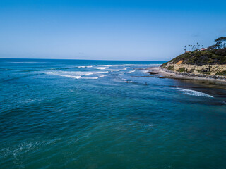 Fototapeta na wymiar Waves on the beach in Encinitas, CA