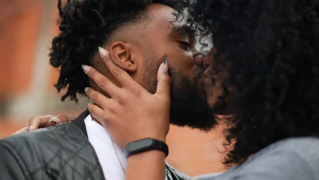 A latin black couple kissing each other boyfriend and girlfriend kiss