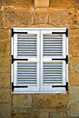A Louvered White Window in Mdina