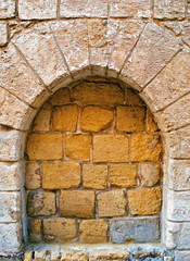 Fototapeta na wymiar A Blocked Ancient Norman Medieval Arch in Mdina