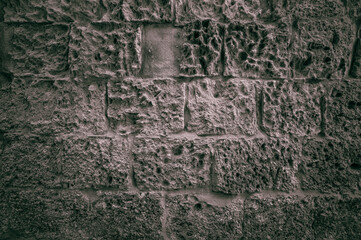 An eroded limestone wall in Mdina