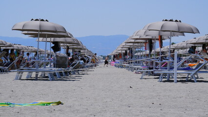 Umbrellas and sunbeds on the beach 