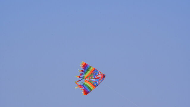 Colorful kite flying in the wind 