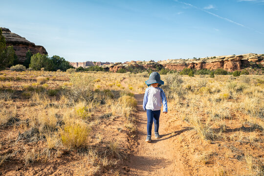 Girl hiking in Canyonlands National Park, Utah