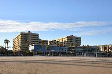 Fototapeta premium Luxury apartments at La Patacona Beach. Hotel in Alboraya. Living Valencia Patacona Beach. Travel on touristic famous and popular Beaches of Valencia with unique landscape. Beach at sea near apartment