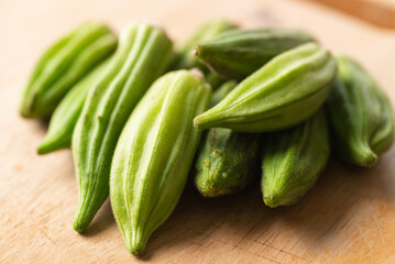 Green okra or ladies' fingers (Edible green seed pods), Organic vegetables from local farmer market