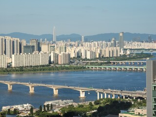 Panoramic view the Seoul city and Han river. Cityscape with high buildings and skyscrapper.