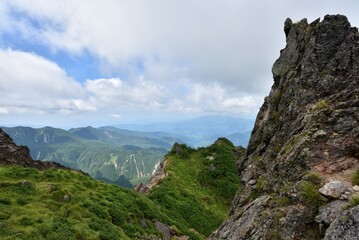 Naklejka premium Mountain climbing in summer season