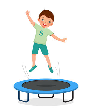 little boy jumping on a trampoline having fun playing outdoor sport activity