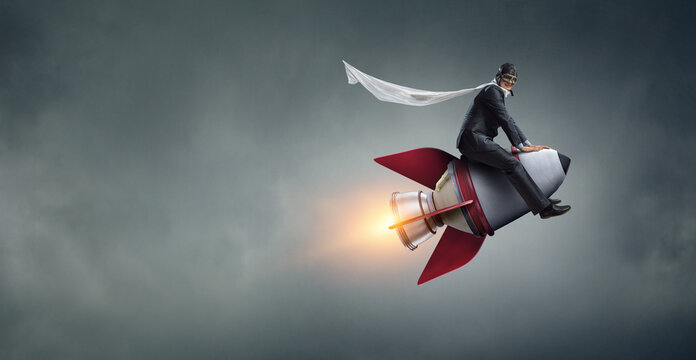 Businessman on a rocket . Mixed media