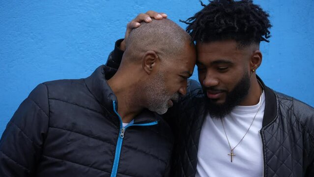 Father and adult love and affection together real life laugh and smile