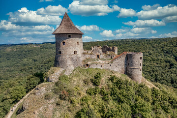 Aerial view of Somosko medieval castle between Slovakia and Hungary on a hilltop with triangle...