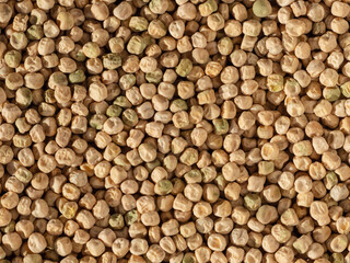 Background of pea seeds. Dry yellow peas close-up as a natural background