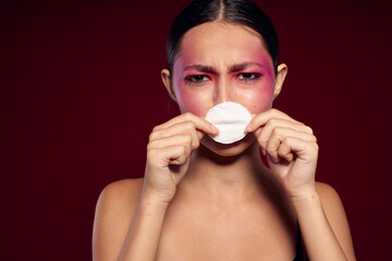 Sexy brunette woman bright makeup posing fashion emotions cosmetics studio model