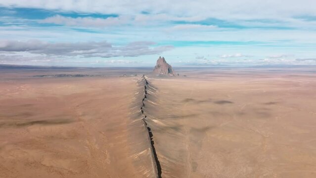 Unique terrain without any greenery below cloudy blue skyline