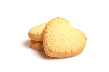 Three lemon cookies in the shape of a heart