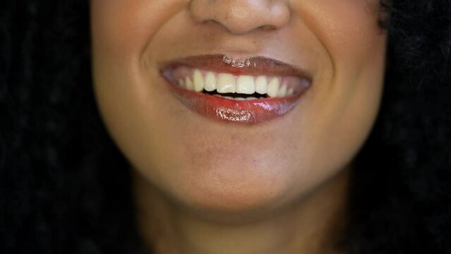 A black woman smiling mouth macro close-up
