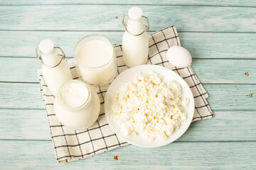 Flat lay composition with different dairy products. homemade dairy products on a blue table