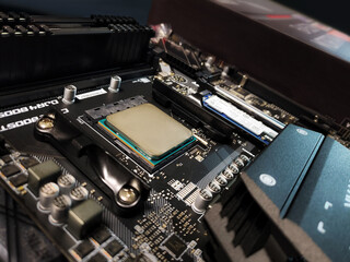 Motherboard and processor in socket of a gaming computer