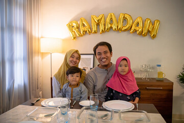 muslim asian family breaking the fast together