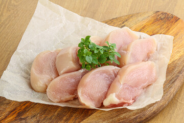Raw chicken breast slices for cooking
