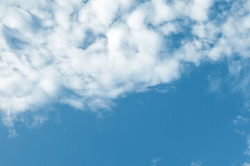 Background with clouds scatter on blue sky, beautiful nature
