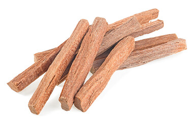 Chandan or sandalwood isolated on a white background. Sandalwood sticks. Perfume.