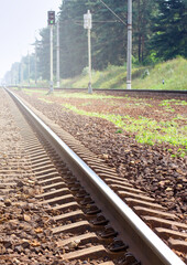 One railroad track leading to the light