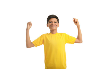 Indian child giving expression on white background.