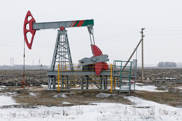 Pump-jack group in the steppe. Drilling for gas and oil