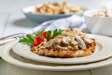 Cauliflower steak with mushrooms.