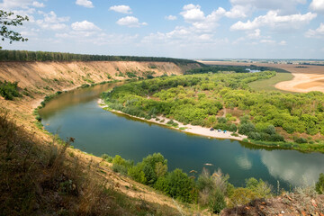 Panorama of the tract Krivoborye, Ramonsky district of the Voronezh region. Steep forested sandy slope of the Don River