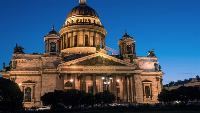 View of the st. Isaacs Cathedral and moon at night. Time-lapse.