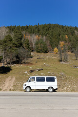 Fototapeta premium car on the background of the mountains trip vacation