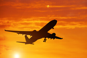 Fototapeta na wymiar Silhouette of a passenger taking off at the airport. Tourism concept after the Covid-19 crisis